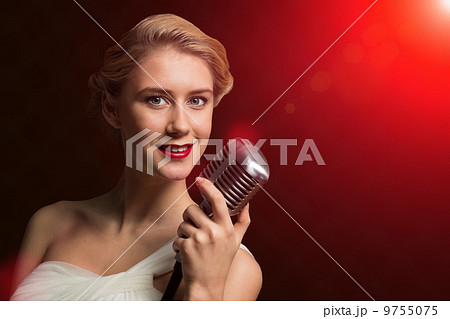 attractive female singer with microphone attractive female singer with microphone 9755075