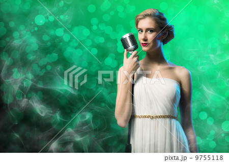 attractive female singer with microphone 9755118