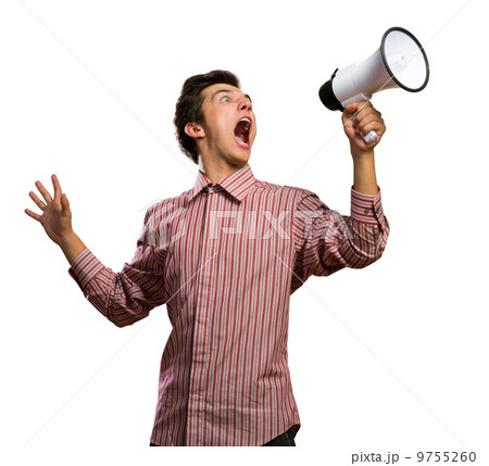 Portrait of a young man shouting using megaphone Portrait of a young man shouting using megaphone 9755260