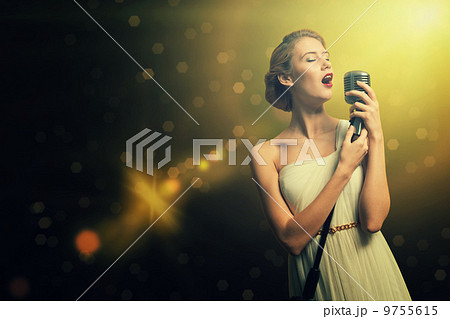 attractive female singer with microphone attractive female singer with microphone 9755615