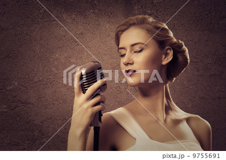 attractive female singer with microphone attractive female singer with microphone 9755691