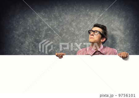 man holding a banner 9756101