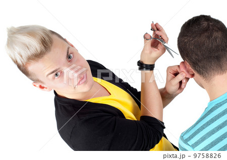 Hairdresser working with scissors 9758826