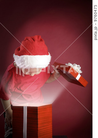 happy boy open christmas gift-box 9760475