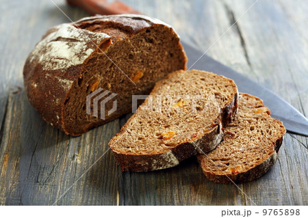 Rye bread with dried apricots and nuts. 9765898