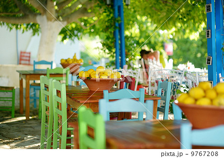 A dish of lemons in typical greek outdoor cafe 9767208