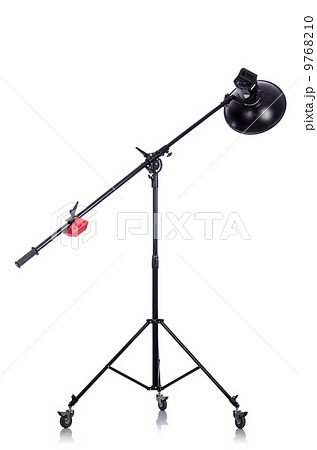 Studio light stand isolated on the white 9768210