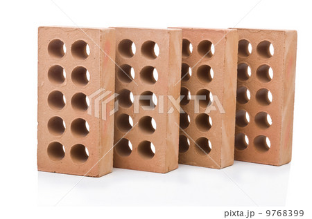 Stack of clay bricks isolated on white Stack of clay bricks isolated on white 9768399