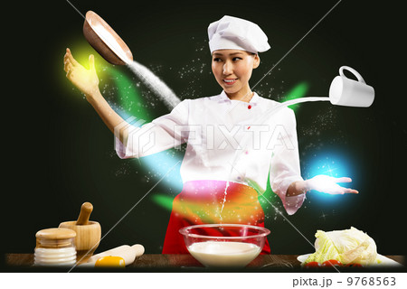 Asian female chef in the kitchen conjures 9768563