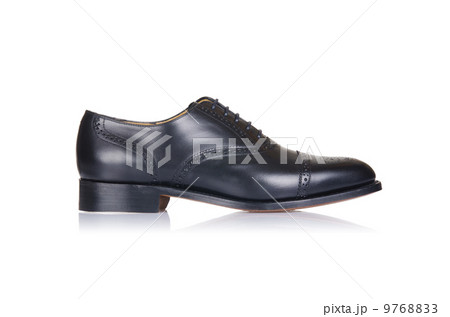Fashion concept with male shoes on white Fashion concept with male shoes on white 9768833