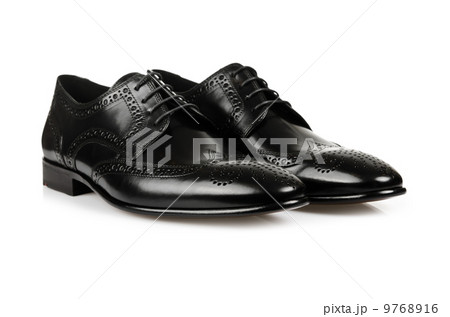 Fashion concept with male shoes on white Fashion concept with male shoes on white 9768916