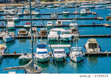 Port with many yachts on summer day 9769039