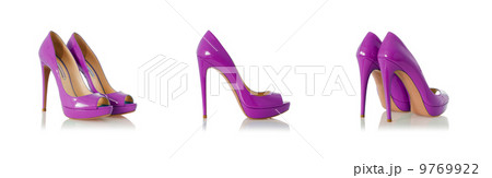 Set of woman shoes isolated on the white 9769922