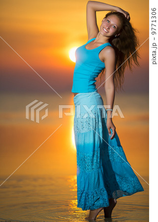 Smiling blonde at sunset Smiling blonde at sunset 9771306
