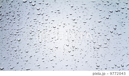 Drops of water on glass 9772043
