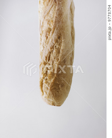 Close up of an organic baked sourdough baguette. Close up of an organic baked sourdough baguette. 9778704