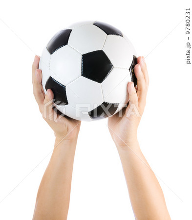Hands holding soccer ball up isolated on white Hands holding soccer ball up isolated on white 9780231