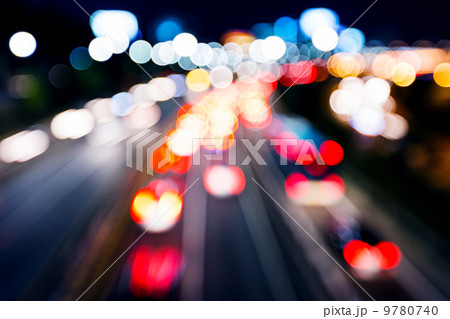 Blurred unfocused highway view at night Blurred unfocused highway view at night 9780740