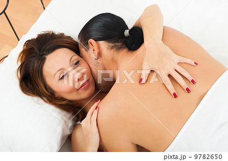 adult couple having sex on white sheet 9782650