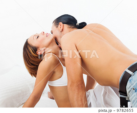 Loving middle-aged couple in bed Loving middle-aged couple in bed 9782655