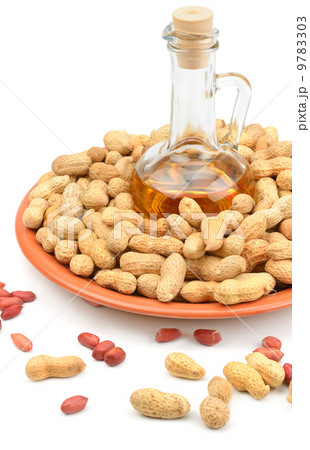 Peanuts and peanut butter isolated on white background Peanuts and peanut butter isolated on white background 9783303