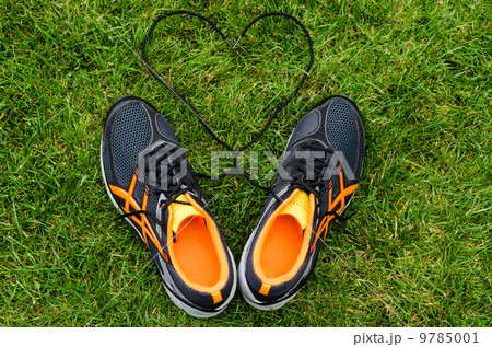 Sneakers on grass with heart Sneakers on grass with heart 9785001