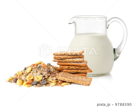 Glass jug with milk, cracker and muesli Glass jug with milk, cracker and muesli 9788390