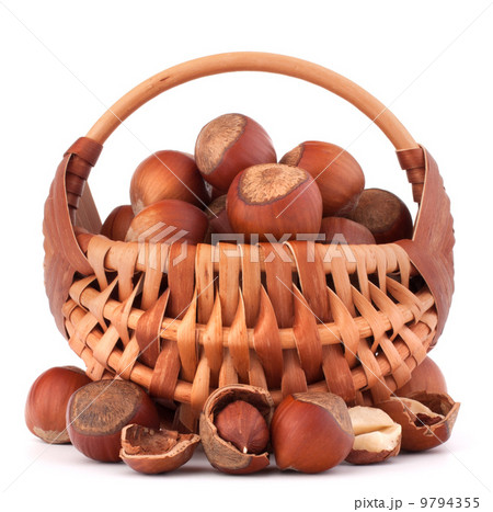 Hazelnuts in wicker basket 9794355
