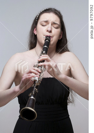 Young Female Musician Playing Clarinet Young Female Musician Playing Clarinet 9797092
