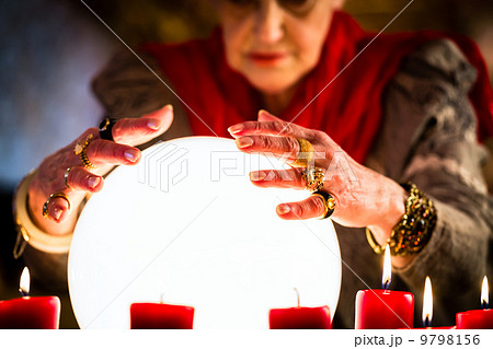 Soothsayer during a Seance or session with Crystal ball Soothsayer during a Seance or session with Crystal ball 9798156
