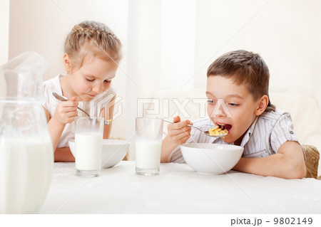 Children eat breakfast Children eat breakfast 9802149
