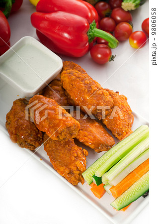 buffalo chicken wings served with pinzimonio buffalo chicken wings served with pinzimonio 9806058