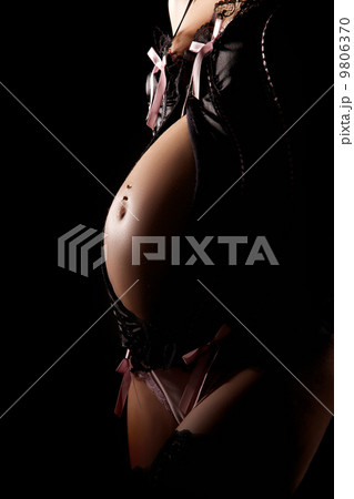 stomach of pregnant woman stomach of pregnant woman 9806370