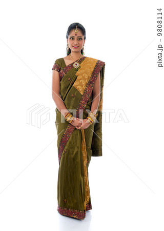 traditional indian woman in saree with white background full bod 9808114