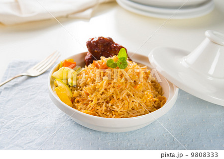 Biryani chicken rice cooked in arab style tajine with traditiona 9808333