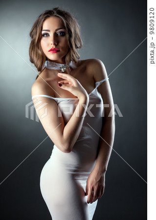 Portrait of sensual model in skin-tight negligee Portrait of sensual model in skin-tight negligee 9809120