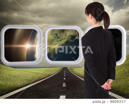 Composite image of businesswoman standing Composite image of businesswoman standing 9809357