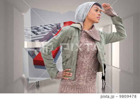 Composite image of concentrated young model in winter clothes wa 9809478
