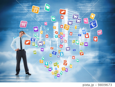 Composite image of thoughtful businessman with hand on head 9809673