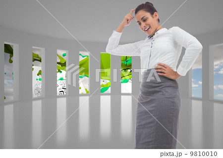 Composite image of smiling thoughtful businesswoman Composite image of smiling thoughtful businesswoman 9810010