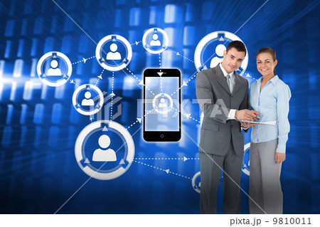 Composite image of business partners with clipboard Composite image of business partners with clipboard 9810011