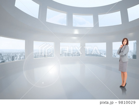 Composite image of smiling thoughtful businesswoman Composite image of smiling thoughtful businesswoman 9810029