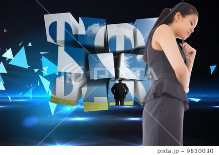 Composite image of thinking asian businesswoman 9810030