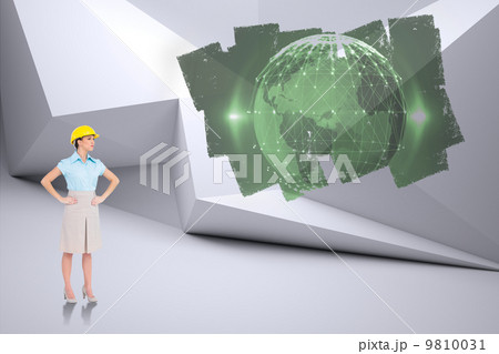 Composite image of serious attractive architect posing 9810031