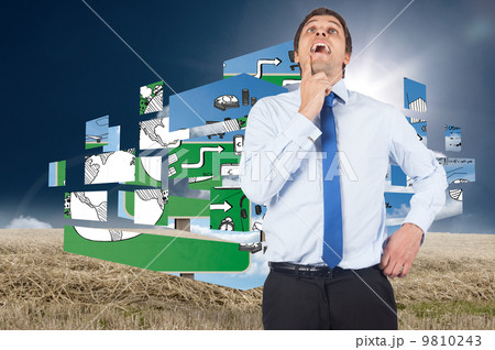 Composite image of thinking businessman touching his chin 9810243