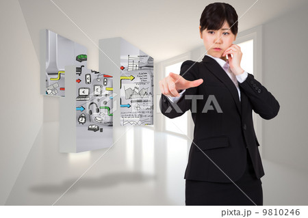 Composite image of businesswoman pointing 9810246