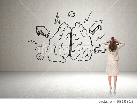 Composite image of businesswoman with hands on head standing bac 9810313