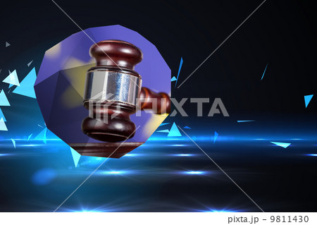 Composite image of hammer and gavel on abstract screen 9811430