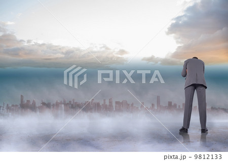 Composite image of thoughtful businessman 9812133