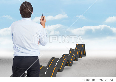 Composite image of thinking businessman holding pen Composite image of thinking businessman holding pen 9812178